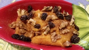 A less traditional route: Mashed sweet potato with raisins, walnuts, and a little maple syrup.